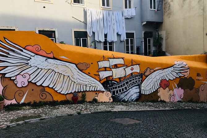 3-Hour Guided Street Art Walking Tour of Lisbon - Stop 3: Baixa de Lisboa, azulejos and cobblestones with stories behind them