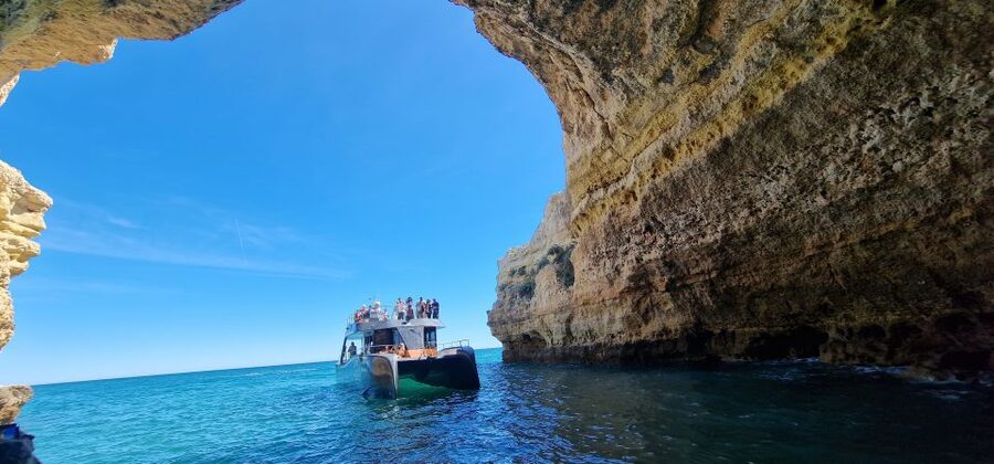 Albufeira: Coastline and Benagil Caves Tour by Catamaran - Albufeira to Benagil by catamaran: what you’re really buying