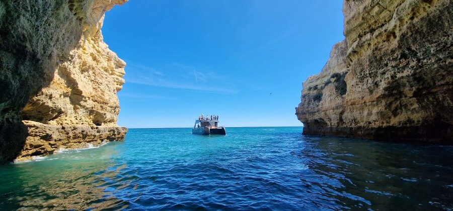 Albufeira: Coastline and Benagil Caves Tour by Catamaran - Entering the Benagil area: the Sea Cave and Cathedral Cave viewpoints