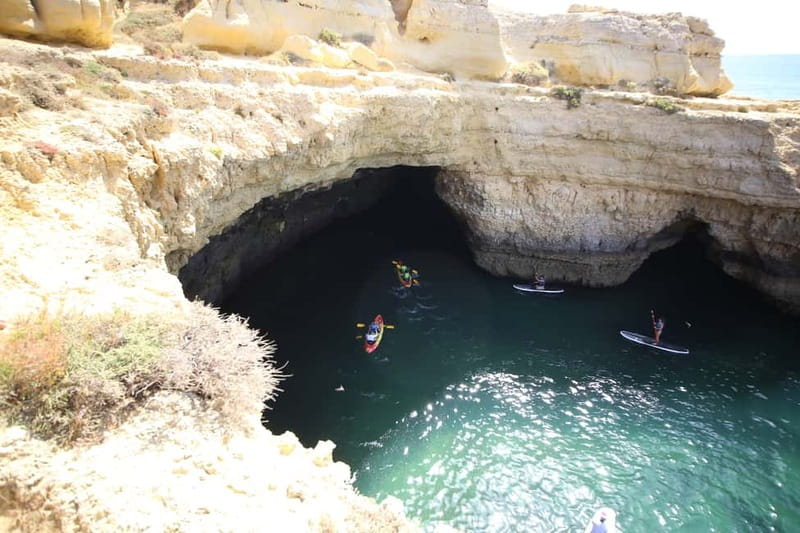 Albufeira: Hidden Beaches & Cliffs Guided Kayak Cave Tour - Entering sea caves: what it feels like in the real world
