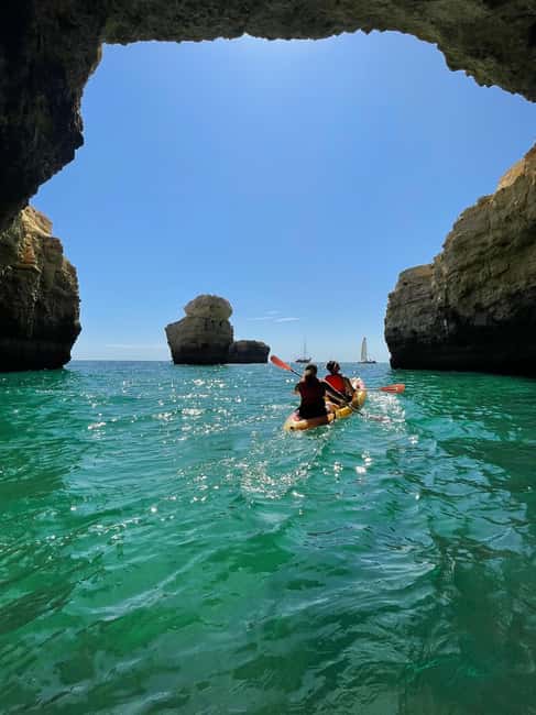 Albufeira: Secret Caves & Beaches Kayak Tour with Swim Stop - Praia da Coelha and the sightseeing paddle back