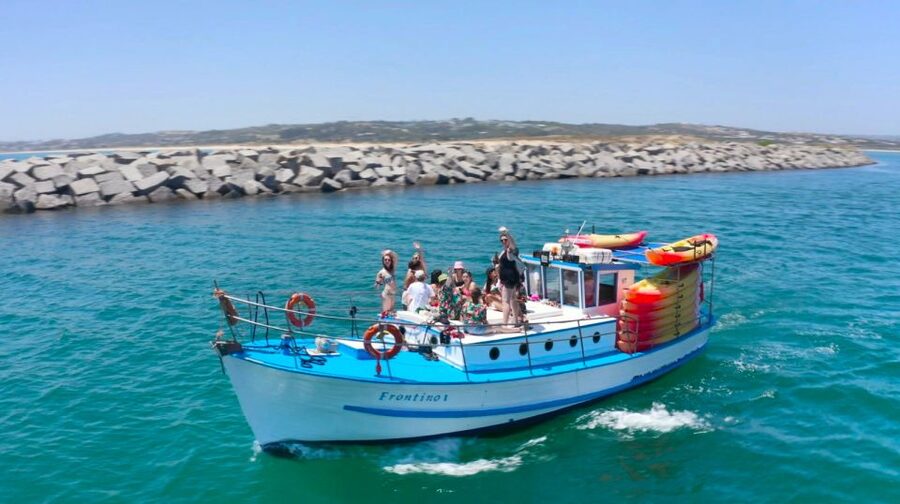 Alvor: Explore Caves Boat and Kayak Tour - The first cruise leg: Alvor to Praia do Vau area and the payoff of deck time