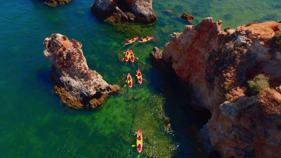 Alvor: Explore Caves Boat and Kayak Tour - Kayaking into sea caves: what it feels like and why the coaching matters