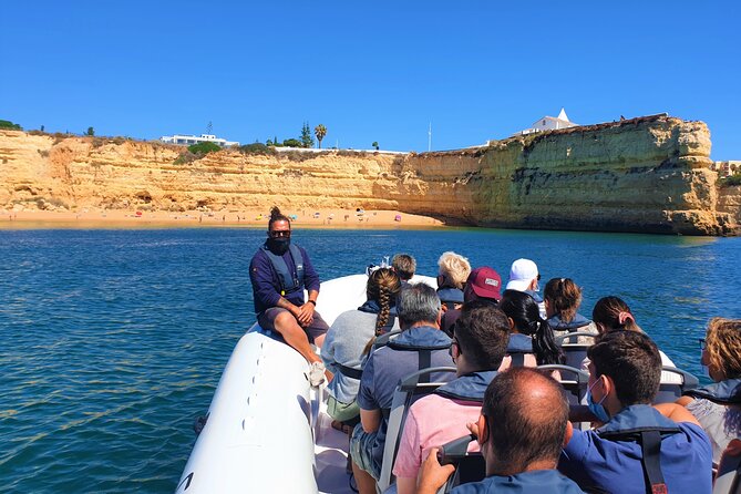 Benagil Caves Visit with Dolphins Watching from Albufeira - On-water comfort: wind, jackets, bouncy waves, and music