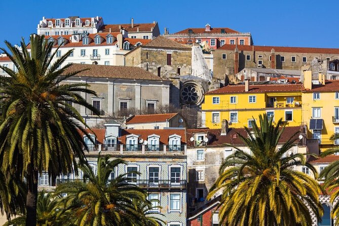 Best of Lisbon Small-Group Guided Walking Tour - Starting at Praça Dom Pedro IV, where the pavement tells a story