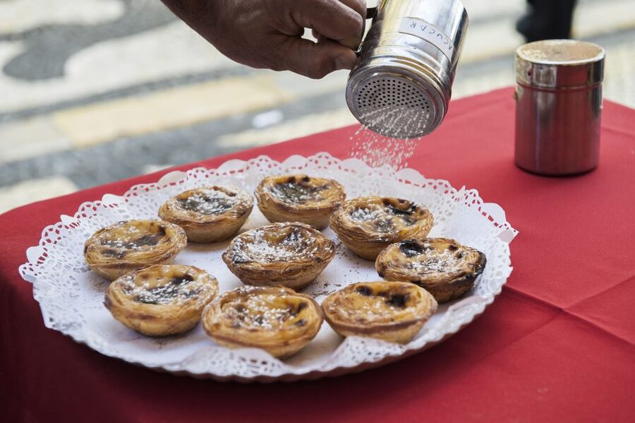 Best of Lisbon Walking Tour: Rossio, Chiado & Alfama - Chiado stroll: cafés, boutiques, theaters, and bookstores