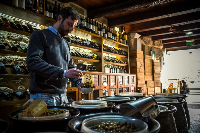 Beyond the Barrel: From Decadent to Down-home in the Heart of Porto - Stop 3 at São Bento: migration history, fruit, vinho verde, and salt cod