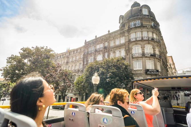 City Sightseeing Porto Hop-On Hop-Off Bus Tour - Audio commentary reality check: headphones included, but adjust your expectations