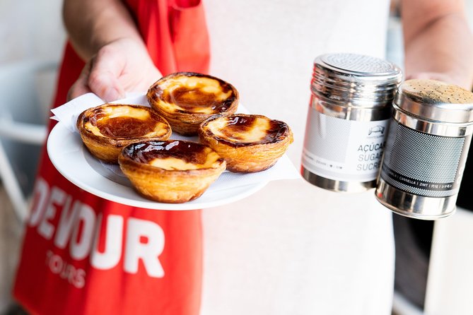 Devour Lisbon: The Ultimate Portuguese Food Tour - Neighborhood walkthrough: Baixa to Chiado to Cais do Sodré by food story