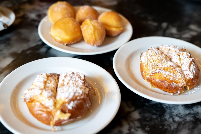 Devour Lisbon: The Ultimate Portuguese Food Tour - What you actually eat: the nine tastings menu, from pork sandwiches to custard tarts