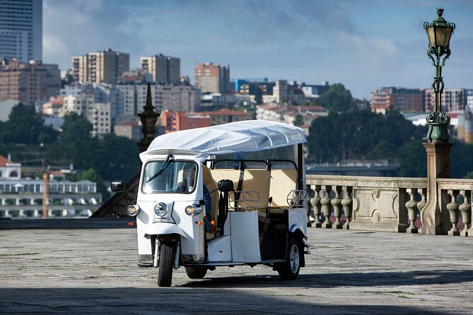 Discover Porto's Highlights on a 2-Hour Private Electric Tuk Tuk - Batalha and Ponte do Infante: switching from old neighborhoods to modern city views