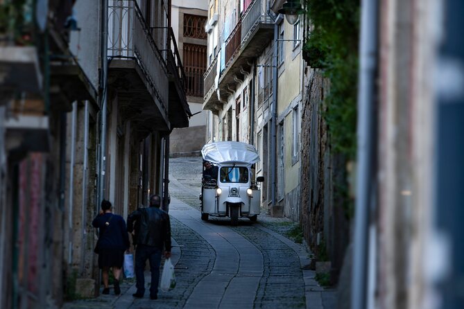 Discover Porto's Highlights on a 2-Hour Private Electric Tuk Tuk - Clérigos Tower: the classic Porto skyline moment