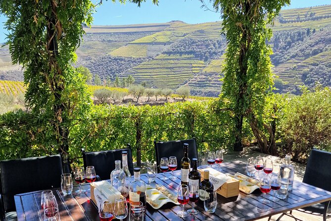 Douro Valley-Expert Guide-Boat-Lunch-Tastings-Offer wine bottle - The Rabelo boat cruise from Companhia Turística do Douro