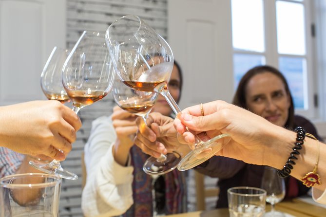 Douro Valley Small-Group Tour with Wine Tasting, Lunch and Boat - Winery stop one in Peso da Régua: Douro DOC tasting in a family-run setting