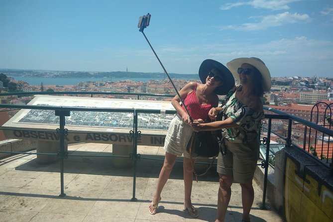 Expert Lisbon Tour with Local Guide in Private Eco Tuk Tuk - Alfama area viewpoints: Sé, Portas do Sol, and the best kind of photo chaos