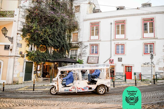 Expert Plus Lisbon Tour with Local Guide in Private Eco Tuk Tuk - Museum of Art, Architecture and Technology facade, plus Cais do Sodré by night energy