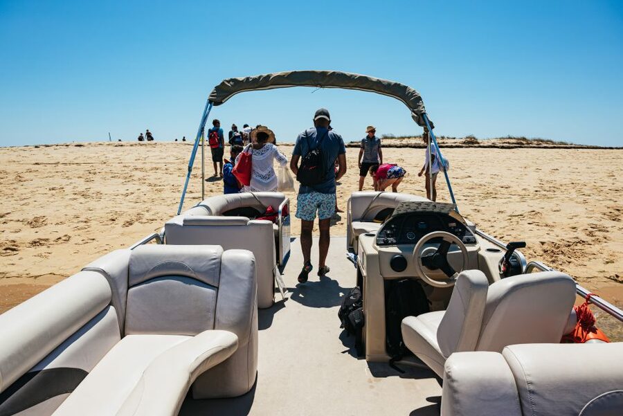 Faro: Deserta Island and Farol Island Catamaran Boat Trip - Farol Island: Culatra Lighthouse walk and beach-swim payoff