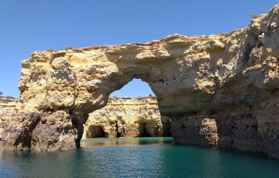 From Albufeira: Benagil Caves and Dolphins Guided Boat Tour - Benagil Caves: What the Cave Stops Really Feel Like