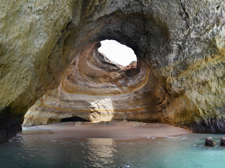 From Carvoeiro: Benagil Caves and Praia da Marinha Boat Trip - Small-boat cruising: life jackets on, and why the crew’s handling matters