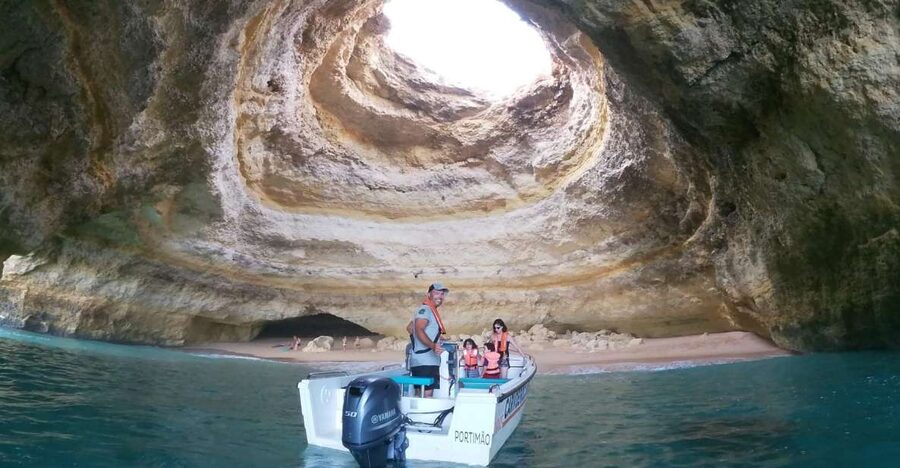 From Carvoeiro: Benagil Caves and Praia da Marinha Boat Trip - Carvoeiro Beach check-in, the dolphin booth, and getting on the boat without stress