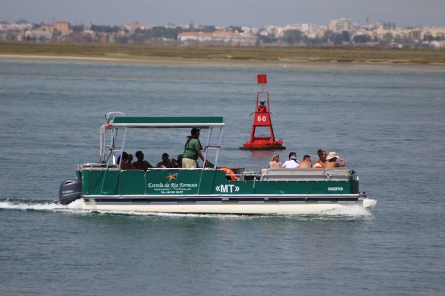 From Faro: 2-Island, 2-Stop Ria Formosa Catamaran Tour - Passing the Cape of St. Mary, then heading toward Farol Island