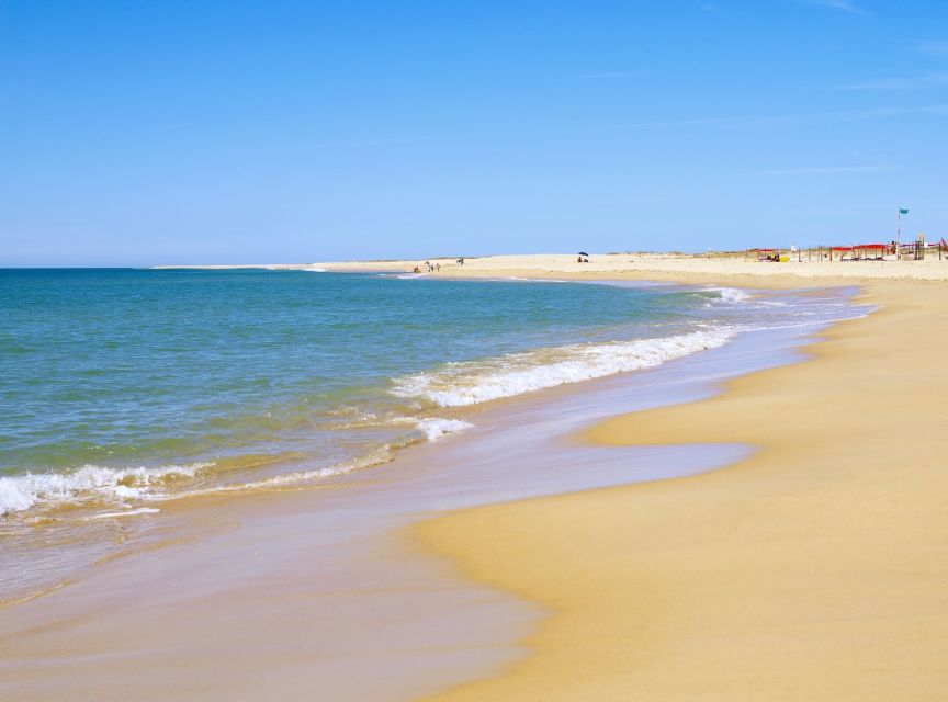 From Faro: 4 Stops, 3 Islands in Ria Formosa Catamaran Tour - Catamaran Comfort, Safety Gear, and What to Bring