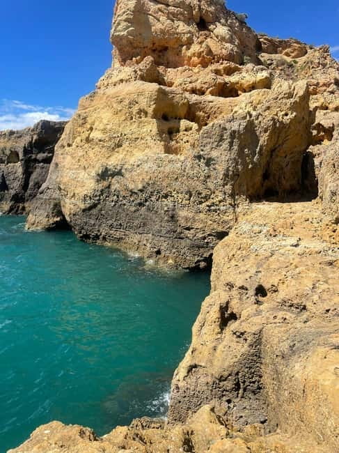 From Faro: Adventure Express Tour - Cliff Jump & Beach - Algar Seco caves: photo stops, hiking, and the cliff jump question
