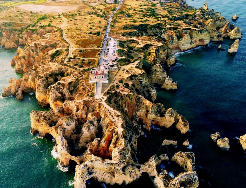 From Lagos: 2.5-Hour Guided Coastal Boat Tour & Grotto Visit - Going into the grotto by smaller boat