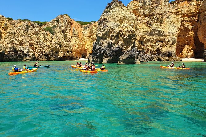 From Lagos: Kayak Tour of Ponta da Piedade Caves on Catamaran - The Swim and Slide Break, Plus the Return Coastal Cruise
