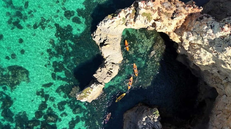 From Lagos: Ponta da Piedade Caves Kayak Tour from Catamaran - The end of the paddle: swim time, onboard slide, and getting that Atlantic refresh
