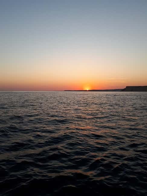 From Lagos: Ponta da Piedade Sunset Cruise with Drink - The sea caves and cliffs: your best moments for photos and wonder