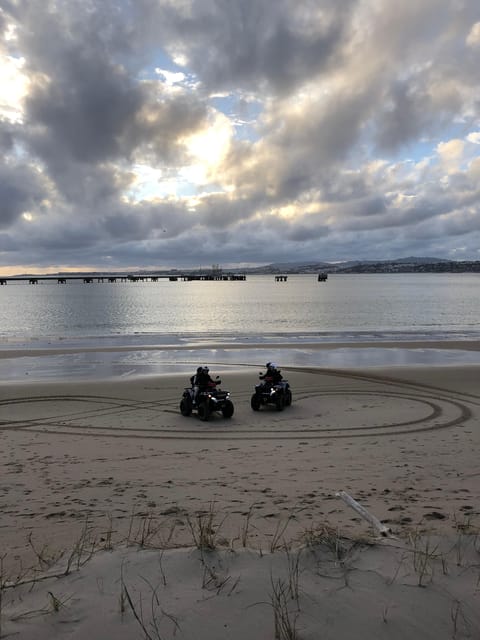 From Lisbon: Atlantic Coast Guided Quad Bike Tour - A 16th-century monastery stop with city scenes and beach views