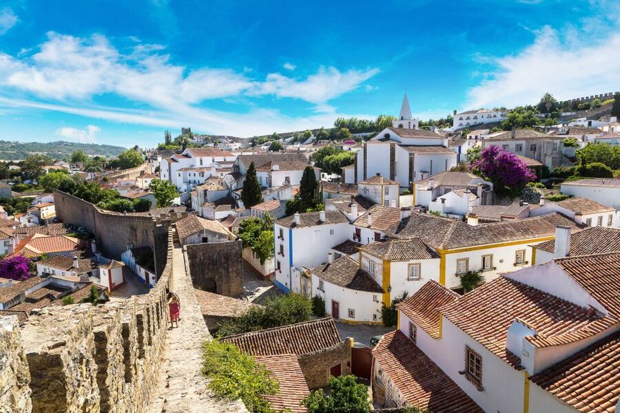 From Lisbon: Day Trip to Porto, Óbidos, and Nazaré - The Óbidos Stop: Medieval Walls, Castle Views, and the Secret Jewish Neighborhood