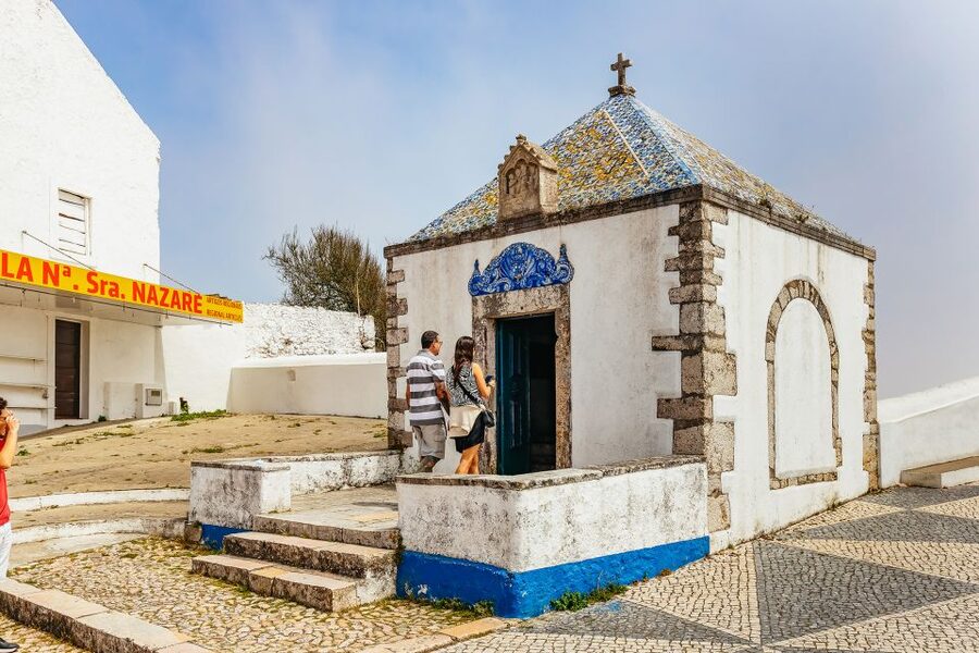 From Lisbon: Fatima Batalha Nazaré & Óbidos Small-Group Tour - Nazaré: Giant Wave Views, Lighthouse Stops, and Real Coastal Life