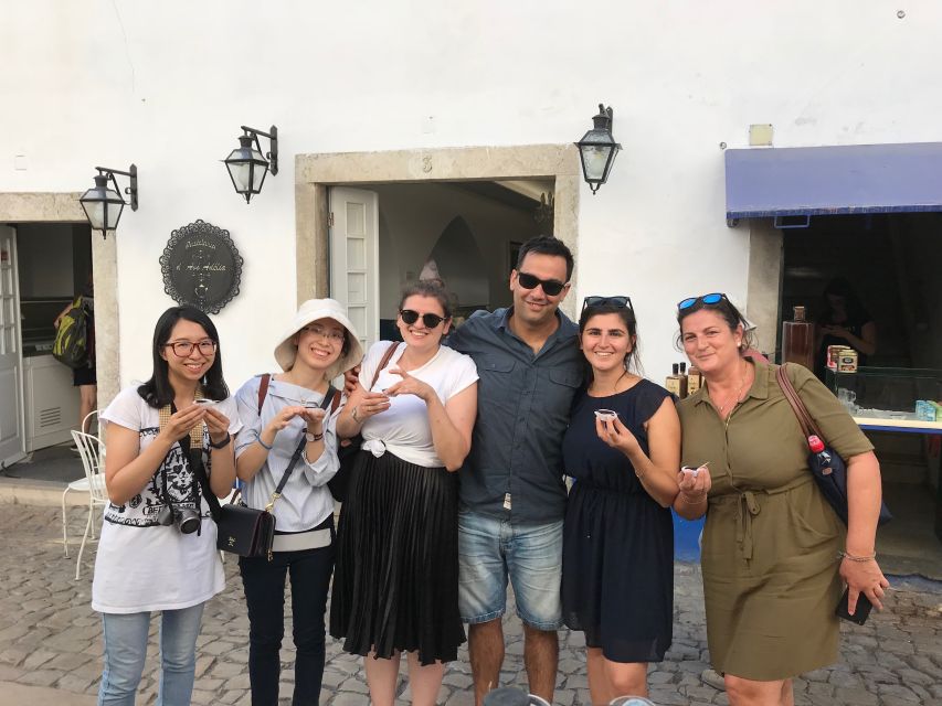 From Lisbon: Fatima, Nazare, and Obidos 8-People Group Tour - Fatima Sanctuary: Pilgrim Lanes, Shepherd Children, and a Berlin Wall Piece