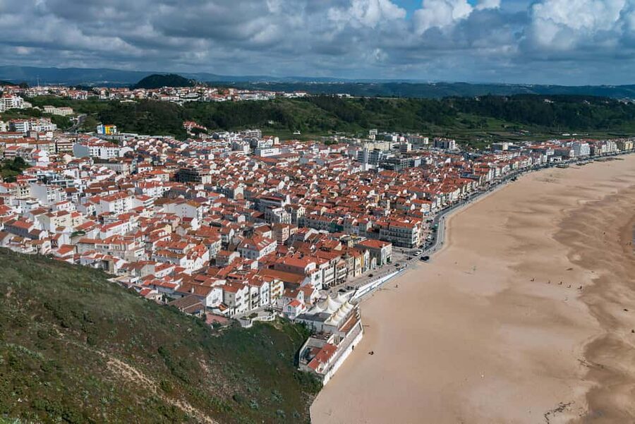 From Lisbon: Fatima, Nazaré, and Óbidos tour with an Italian guide - Óbidos walls and old streets, plus the ginjinha in chocolate