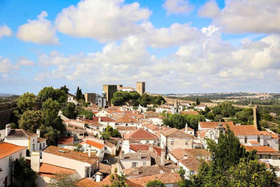 From Lisbon: Fátima, Óbidos, and Nazaré Small Group Day Tour - Fátima Sanctuary: guided meaning plus free time to absorb