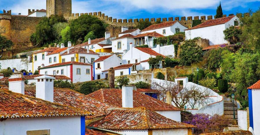 From Lisbon: Fátima Sanctuary, Nazaré & Óbidos - Nazaré cliff viewpoints and the giant-wave legend, plus a real lunch break