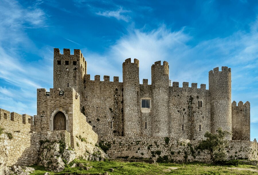 From Lisbon: Tour to Óbidos and Nazaré - Medieval Village, Ginja, and Giant Waves - Óbidos Castle and the ginjinha stop you will actually remember