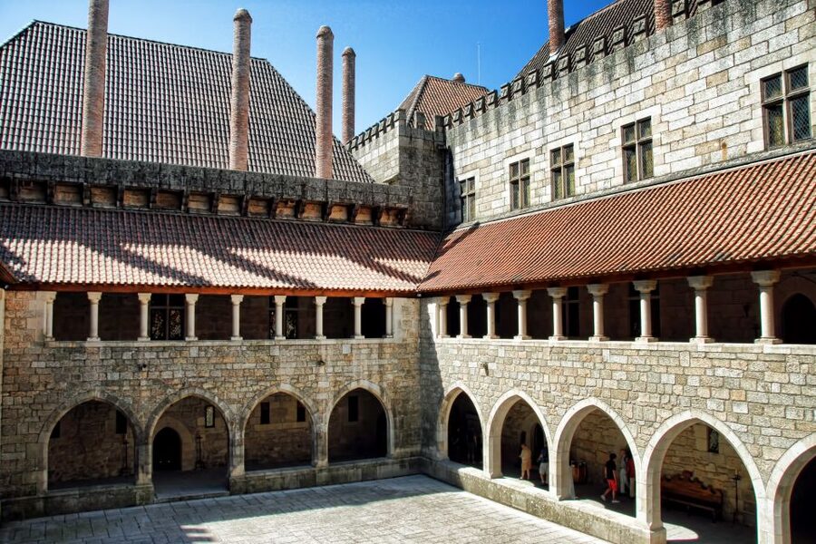 From Porto: Braga & Guimarães with Lunch Small Group Tour - Getting from Porto to Braga by air-conditioned van