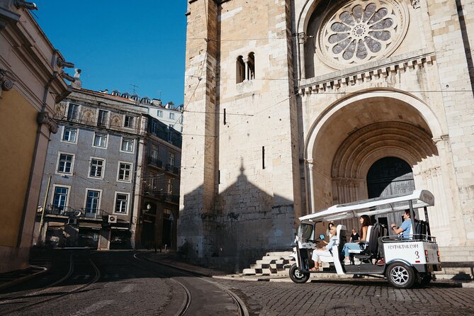 Historic Lisbon Tour with Local Guide in Private Eco Tuk Tuk - Sé de Lisboa and Alfama, the oldest cathedral angle plus fado context