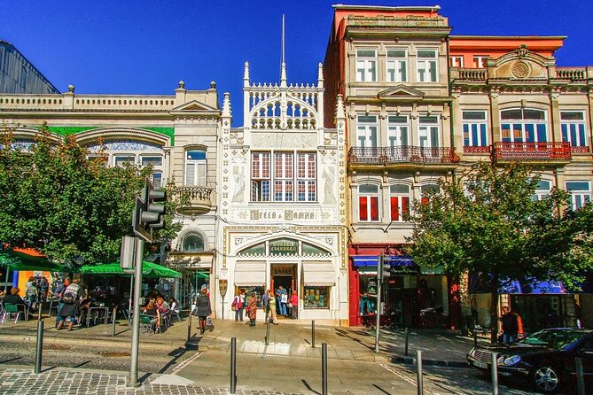 Historic Porto by Private Electric Tuk Tuk to Top Landmarks - Private guide energy, plus one hearing tip