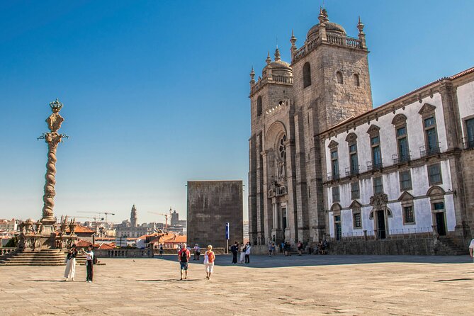 Historic Porto by Private Electric Tuk Tuk to Top Landmarks - São Bento Train Station and Aliados Avenue for city orientation