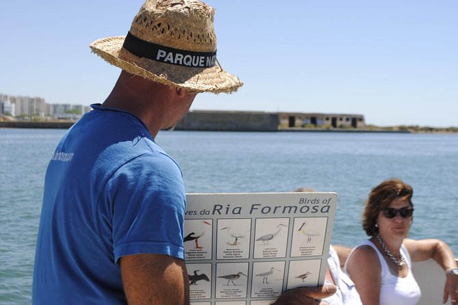 Ilha Deserta and Farol Island: a small group boat trip in Ria Formosa from Faro - Stop 2: Farol Island village stroll, lighthouse, and Santa Maria Cape sands