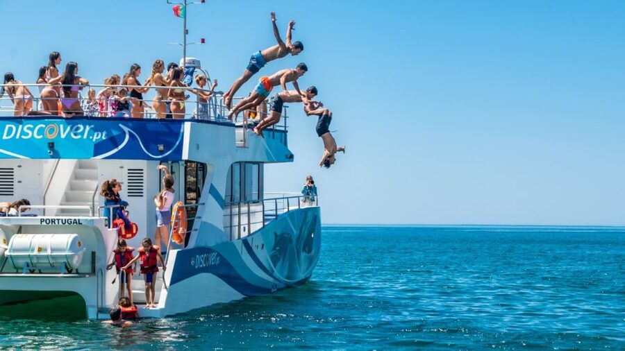 Lagos: Dolphins & Caves - Catamaran - Onboard Comfort: Shaded Seats, Toilets, and a Bar You Might Use