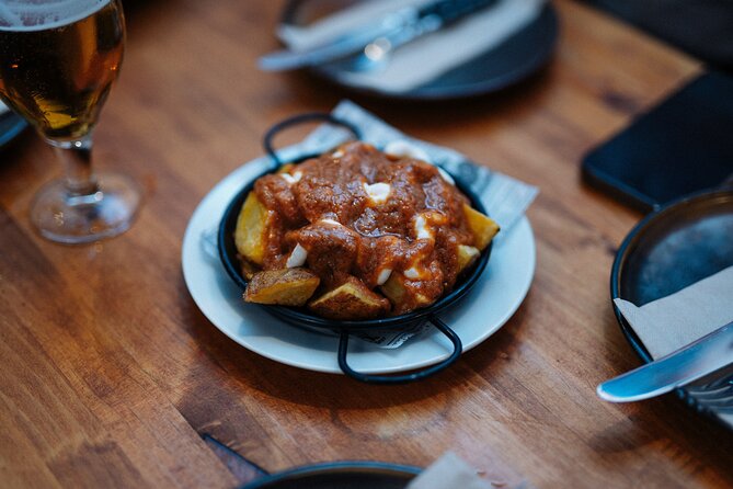 Lisbon: Award-Winning Guided Walking Food Tour with Local Drinks - Stop 1, Supremo Tribunal de Justiça: the quick meet and the food rhythm starts