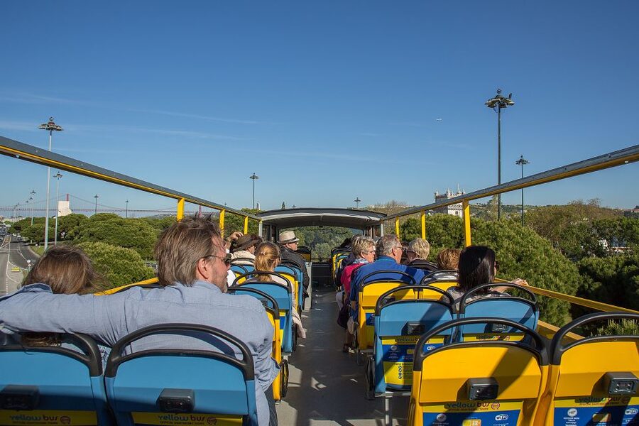 Lisbon: Boat Tour Ticket and Hop-on Hop-off 48-Hour Bus. - Audio guides, headsets, and the on-board experience