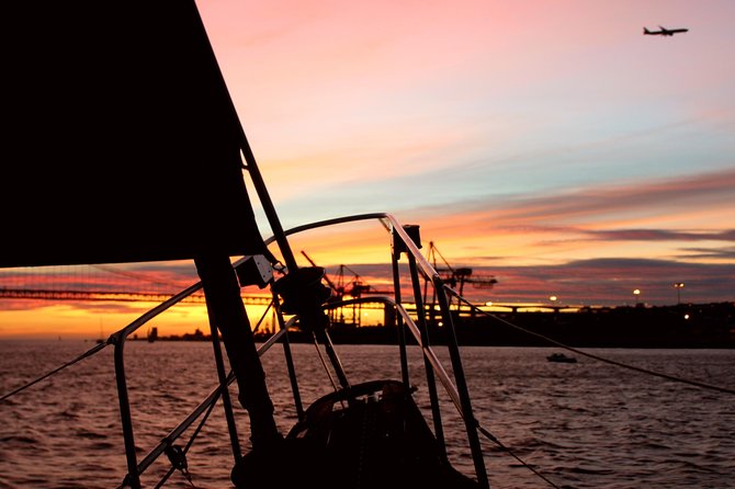 Lisbon: Daylight or Sunset on a Vintage Sailboat - Christ the King at the end of day: the dramatic skyline finale