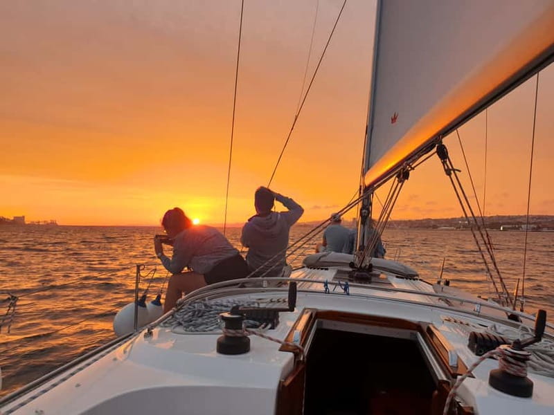 Lisbon: Daytime or Sunset Boat Cruise with History and Wine - Under the Bridges and Toward Alfama: Cristo Rei, 25 de Abril, and the Hill Neighborhood