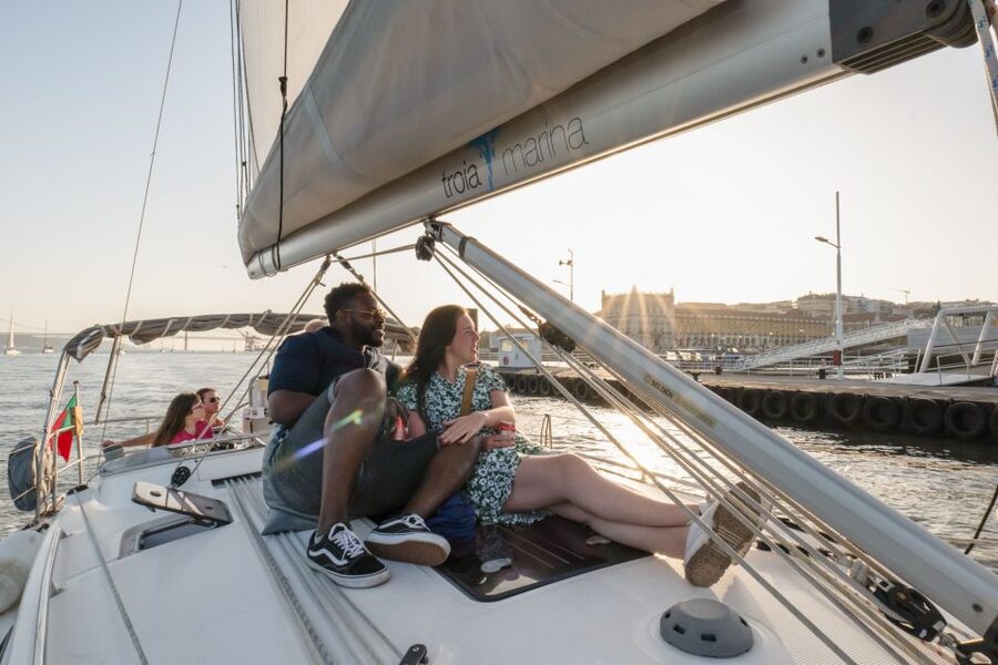 Lisbon: Daytime/Sunset/Night City Sailboat Tour with Drink - Crossing toward Almada and Christ the King: how the skyline changes